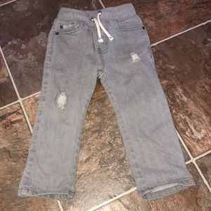 Grey distressed jeans